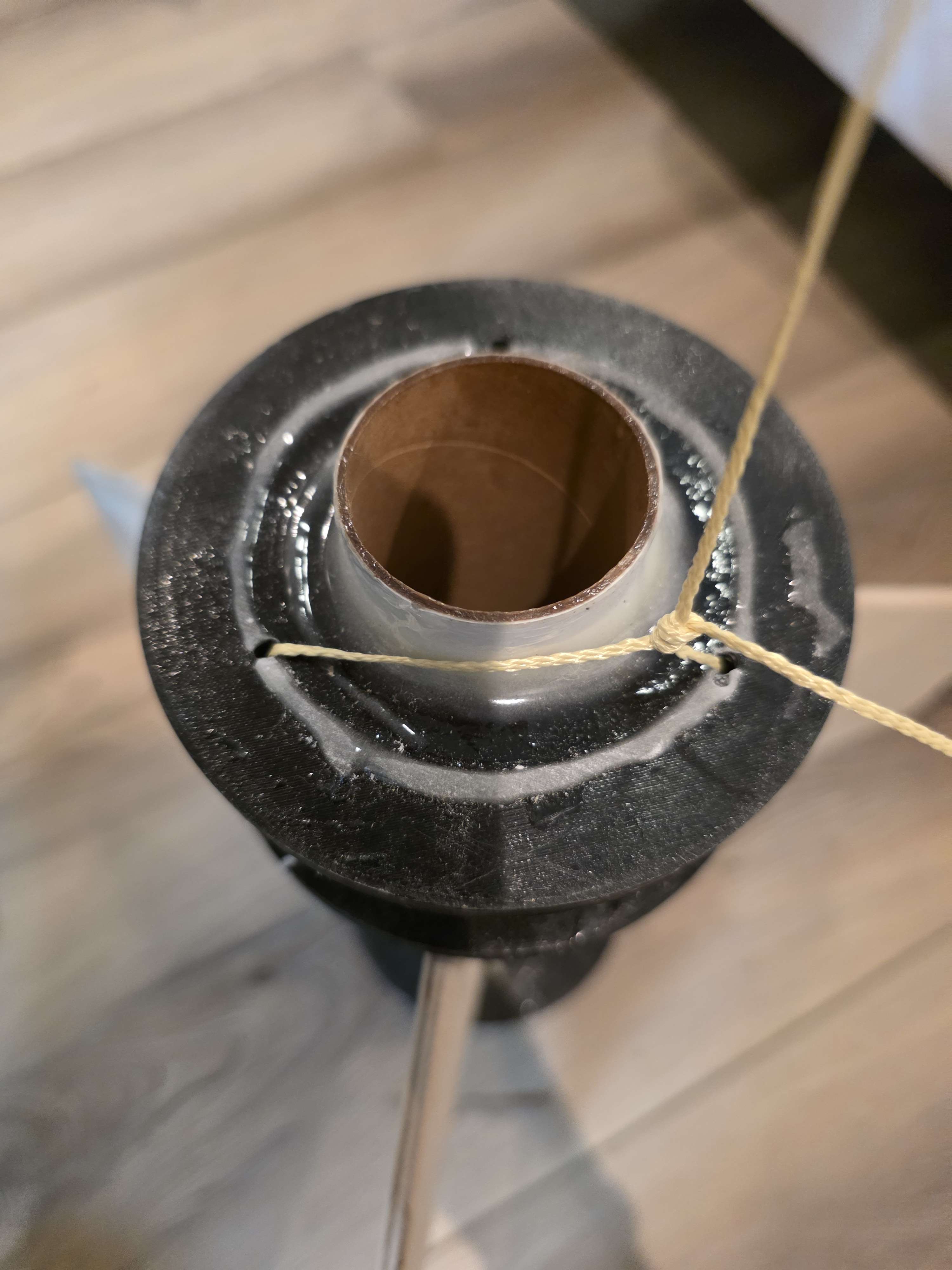 Fin can top view with Kevlar shock cord attached